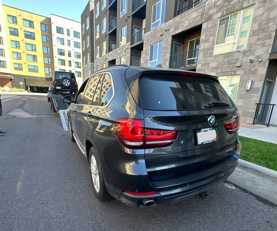 Insured open car transport carrier on a Colorado route